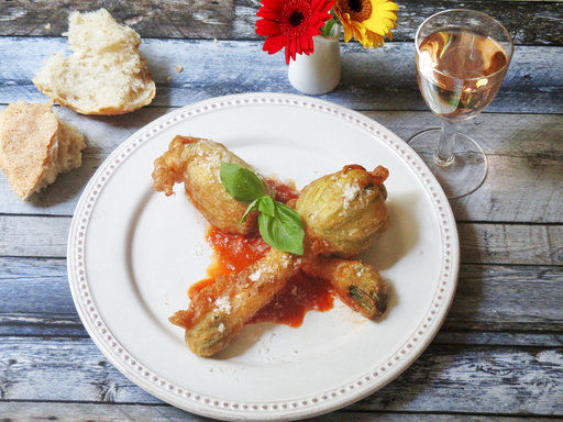 Serve Stuffed Fried Zucchini Blossoms with marina sauce